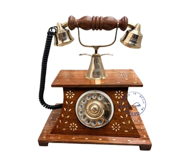 Vintage-style wooden rotary dial telephone with brass accents and floral inlay.